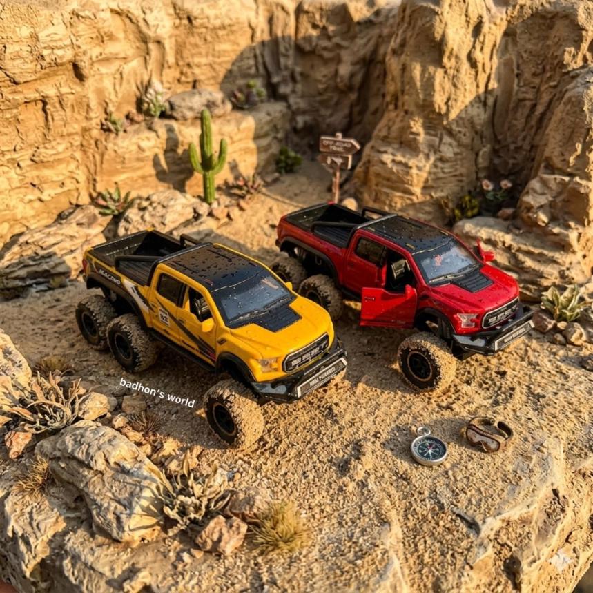 1:24 or 1:28 scale die-cast metal toy models of the Ford F-150 Raptor 6x6 modified pickup truck